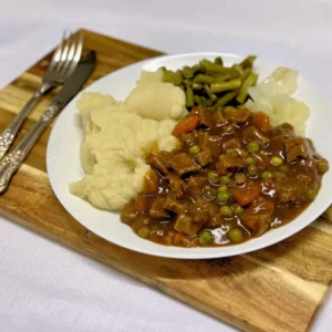 Lamb casserole with mash, beans, cabbage