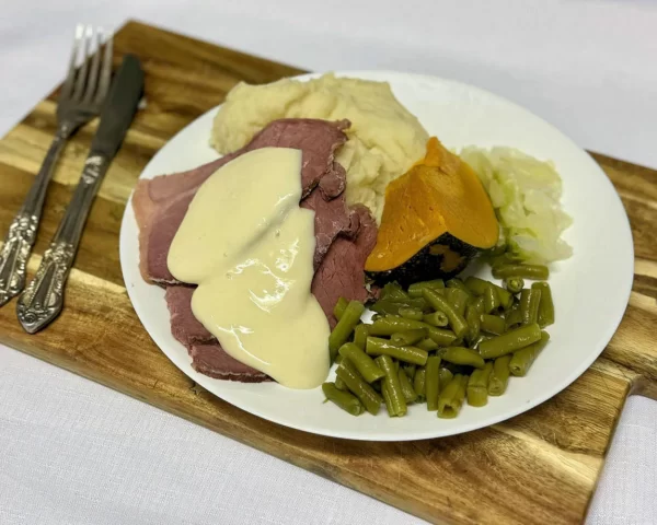 Corned beef silverside with mashed potatoes and vegetables